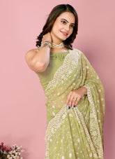 Khaki colour saree looking so attractive